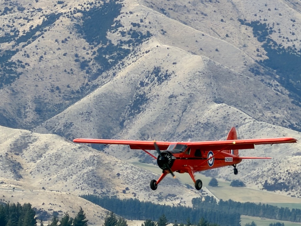 The beautifully presented DHC-2 Beaver ZK-CKH, painted to represent RNZAF NZ6001 City of Auckland, makes a low pass at Warbirds Over Wanaka. First flown in 1947, the Beaver became one of the world's great bush aircraft, renowned for its rugged construction and ability to operate from short and remote airstrips. Powered by a Pratt & Whitney R-985 radial engine, ZK-CKH is itself a very early example of the type, being only the 25th Beaver built.